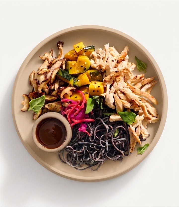 The Black Soba Bowl with Teriyaki Chicken: black edamame soba noodles, roasted kabocha, pickled red cabbage and carrot, teriyaki chicken